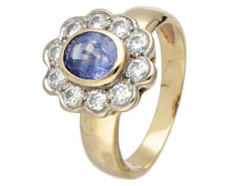 Hallmarks: 750. Set with an oval faceted natural sapphire of approx. 1.58 ct. (approx. 7.4 x 6.0 x 4.4 mm) and 10 brilliant c