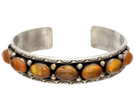 Hallmarks: ZI, 925. Set with 7 cabochon cut amber stones of approx. 12.0 x 8.2 mm. In good condition, light signs of wear on 