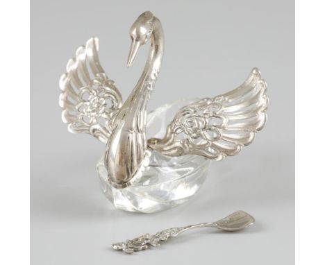 Designed as a swan with crystal glass salt cellar and silver wings and head. Salt spoon with stylized putto. The Netherlands,
