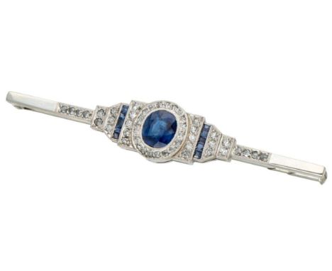 Hallmarks: 750. Set with 48 single cut diamonds of approx. 0.24 ct. (SI-P / H-I) and natural sapphires, one of which is appro