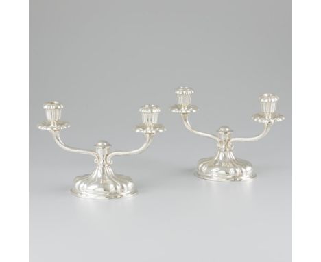 Beautiful set of 2-armed candlesticks with lobed shapes. Austria / Hungary, first half 20th century, hallmarks: PV, 0'835, un