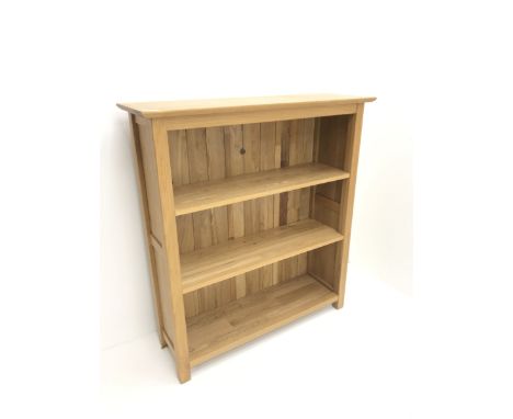 Light oak open bookcase,  two shelves, stile supportsDimensions: Height:&nbsp;107cm&nbsp; Length/Width:&nbsp;98cm&nbsp; Depth