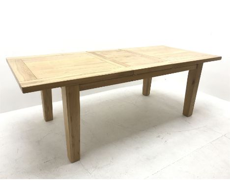 Light oak extending dining table, square tapering supportsDimensions: Height:&nbsp;80cm&nbsp; Length/Width:&nbsp;231cm&nbsp; 