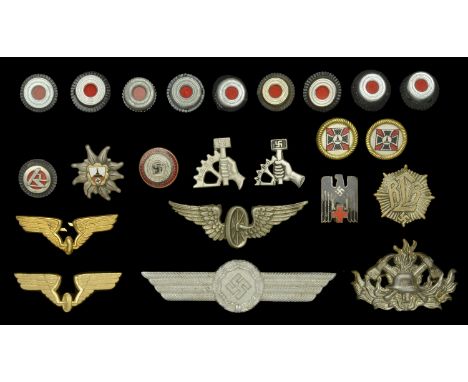 German Second World War Cap Insignia. Nine cap central cockades Metal type. A rare cockade for the SA central wreath. NSDAP c
