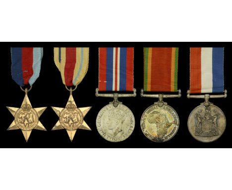 Family group:  Four: Private R. H. Howell, 1st Battalion, South African Police, Union Defence Force, who was taken prisoner o