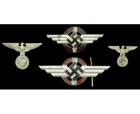 German Second World War DLV Cap Insignia. Two sets of the DLV cap insignia, M.29 cap eagle, mint bright with all fixing pins 