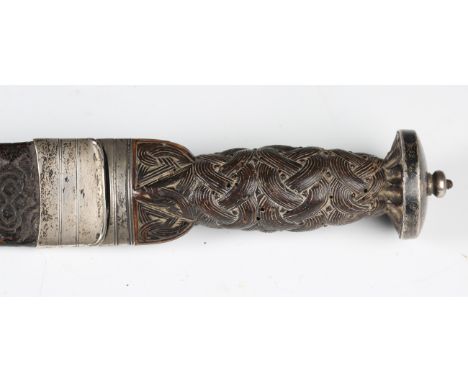 A fine early 18th century Scottish dirk with double-edged softened-fullered blade, blade length 34.5cm, carved oak Celtic kno