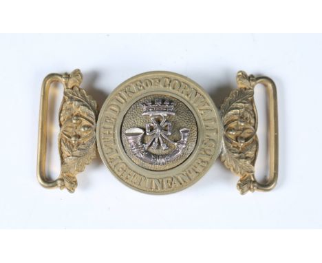 A Victorian Duke of Cornwall's Light Infantry officer's waistbelt buckle with applied silver metal badge.Buyer’s Premium 29.4