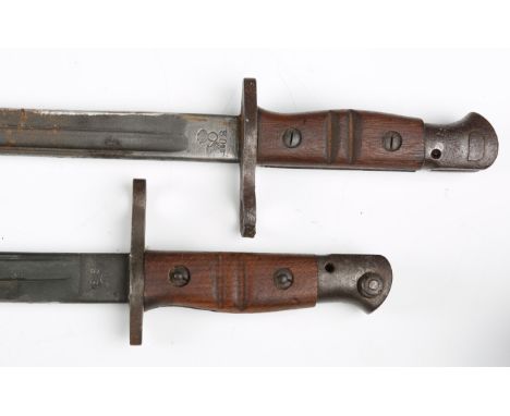 Two First World War period M1917 pattern Remington bayonets, one dated '1918', the other '1917' overstamped '1913', each with