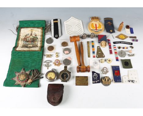 A group of three early 20th century Royal Marines swagger sticks, a First World War period compass, cased, a trench art light