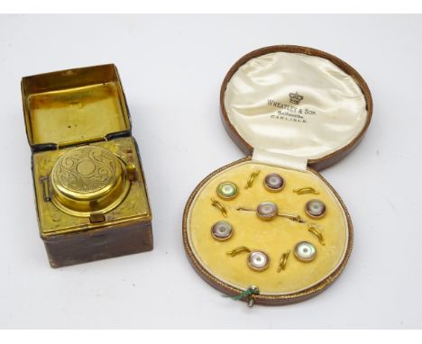 Cased mother-of-pearl dress studs retailed by Wheatley &amp; Sons and Victorian leather bound and brass travelling inkwell (2