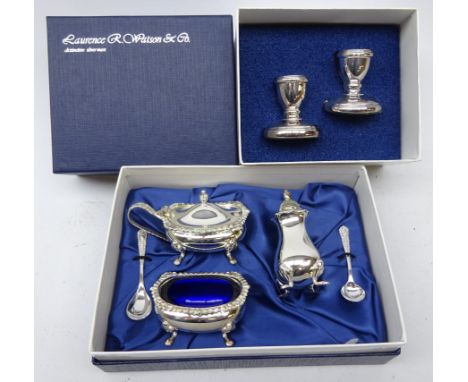 Ex-retail: three piece silver-plated condiment set & pair of silver-plated dwarf candlesticks, both cased by Laurence R. Wats