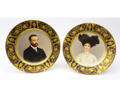 Pair 19th/ early 20th century Volkstedt cabinet plates painted with portrait busts of a lady and gentleman within gilt and co