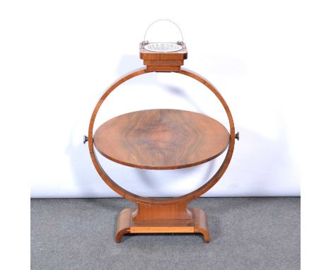 Art Deco walnut veneer smoker's stand, with removable shell-shaped ashtray above a rotating circular shelf, shaped base, heig