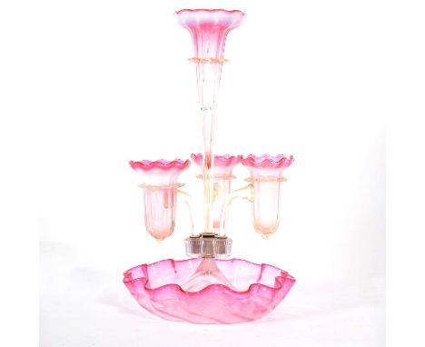 Victorian strawberry tinted and opaline glass epergne, with four flutes, circular base, height 45cm.Condition report:Good con