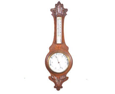 Victorian oak cased aneroid barometer and thermometer, 91cm.Condition report:There are spiders webs on the inside of the face