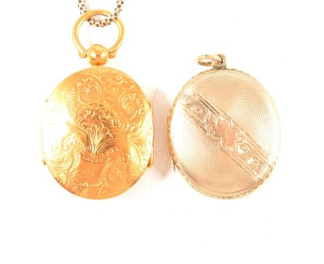A three fold locket and chain, the ovsl floral and scroll engraved locket, 30 x 25mm, holding a photograph and lock of hair, 