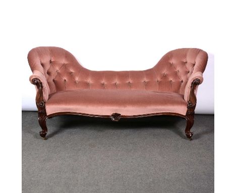 Victorian double chair back sofa, scrolled and carved rosewood frame, buttoned upholstery, on casters, length approximately 1