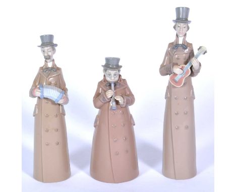 Three Lladro street musicians, Man with Accordion (8171), Man with Guitar, and Man with Clarinet, with boxes, the tallest 23.