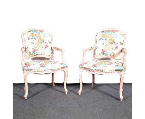 Pair of modern limed beechwood fauteuil armchairs, cotton print upholstery, width 68cm, height 102cm.