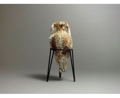 Greek, ceramic amphora jug with rolled rim, short neck with applied handles to the side; rounded body tapering to a point; co
