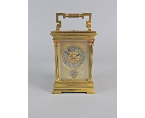 A French gilt brass repeating carriage clock, early 20 th century with 2” circular silvered dial, Arabic numerals, foliate fi