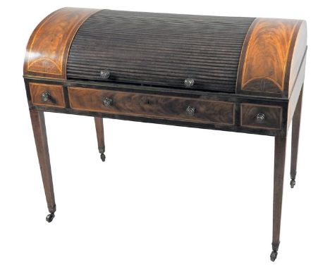 A George III mahogany and satinwood crossbanded cylinder desk, the central tambour shutter opening to reveal a leather lined 