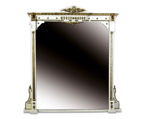 A late Victorian gilt and cream painted overmantel mirror in classical revival style with pointed arch pediment and foliate a