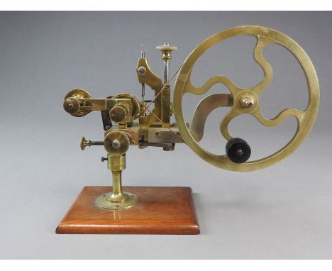 A 19th century Swiss watchmakers’ topping tool. Unsigned, with hand wheel and one cutter. 27cm high