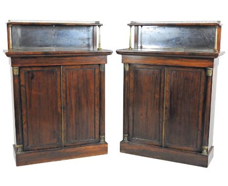 A pair of Regency rosewood and ormolu mounted chiffoniers, each with a low mirror gallery back and shelf supported by ormolu 