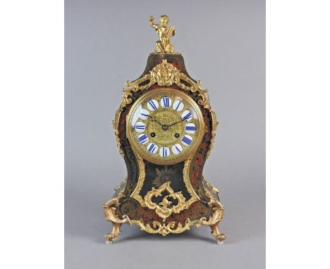 A Louis XV style scarlet boulle mantel clock, 19th century, the 5" dial with white and blue enamel chapters and Roman numeral