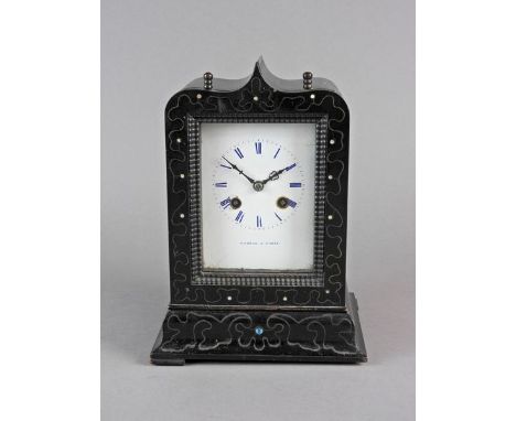 A French ebonised and brass strung mantel clock, 19th century, the 3.5 inch rectangular white enamel dial with blue Roman num