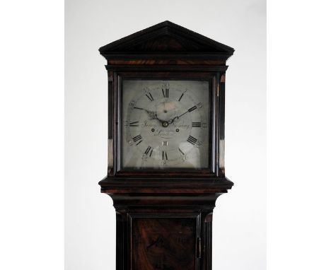 A late 18th-century flame mahogany longcase with associated movement and dial, signed Justin Vulliamy, the hood with architec