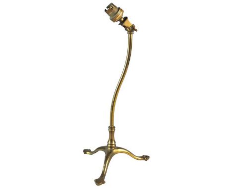 A W.A.S. Benson Arts and Crafts brass adjustable table lamp, stamped W.A.S. Benson to the adjusting screw on a sinuous column