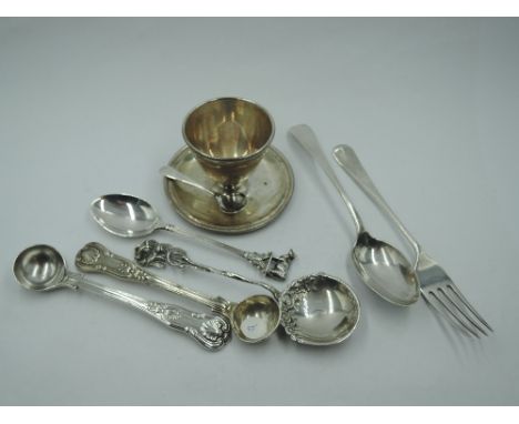 A small selection of HM silver and white metal including egg cup, pair of salt spoons in the Kings Pattern,  jam spoon, child