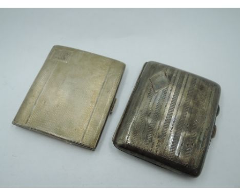 Two HM silver cigarette cases of small rectangular form, both having engine turned decoration,  approx 150g