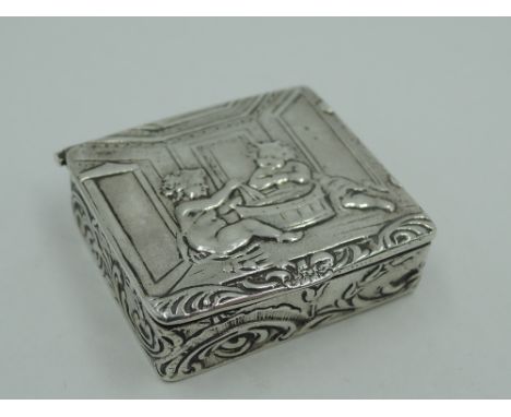 An Edwardian silver patch box bearing scene to lid of babies playing, London 1901, Elly Isaac Miller,  approx 25.3g