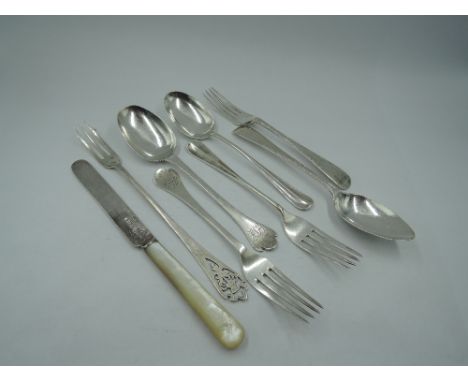 A selection of HM silver cutlery including three pairs of spoon and forks, a Scottish silver pickle fork and mother of pearl 