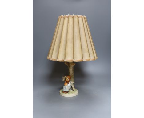 A Hummel figural table lamp,43 cms high including shade.