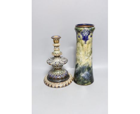 A Doulton Lambeth stoneware vase and similar candlestick by Edith D Lapton, tallest 33cm