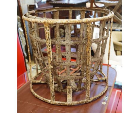 A painted tubular planter / feeder frame, diameter 57cm height 51cm