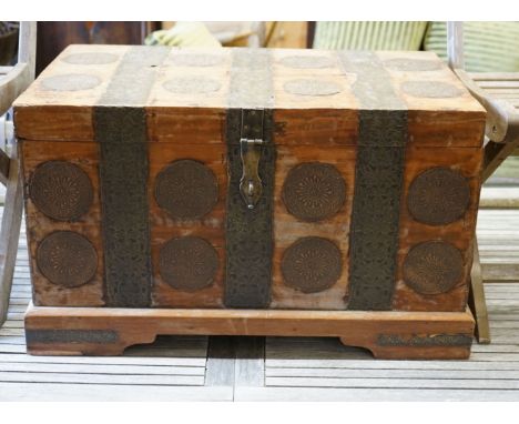 An Indian hardwood and embossed brass trunk, width 76cm depth 44cm height 46cm
