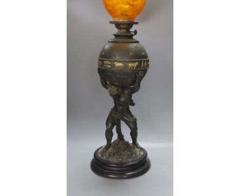 A spelter 'Atlas' oil lamp - 82.5cm tall