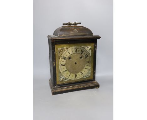 A Chinoiserie mantel clock in need of restoration,35 cms high.