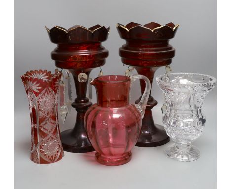 A pair of late 19th century ruby glass lustres, 30cm tall, cranberry jug, Bohemian vase and one other (5)