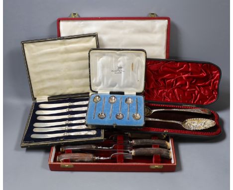 Four cased sets of flatware, including silver 'berry spoons', tea knives, teaspoons and horn handles knives and forks.