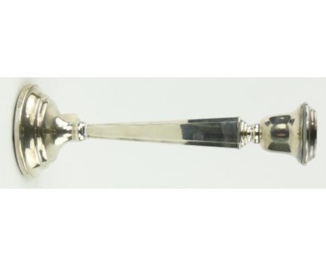 A single silver candlestick,
with tapered square column, height 26cm.