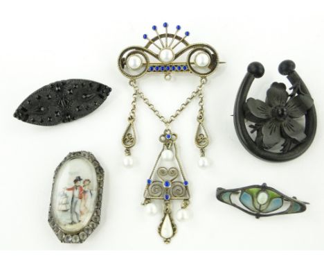 An 18th century clasp with inset painted study of a sailor and girl,
together with other enamel jewellery, etc., (5).