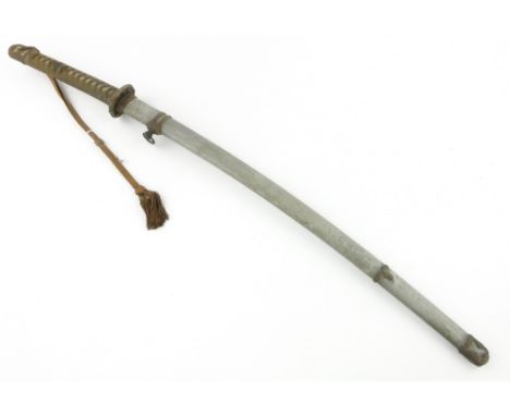 A Samurai sword in scabbard 
by Kanemasa.