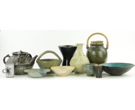 A large Collection of Studio Pottery,
including a Leach vase, height 8.75", a basket, height 7.25" and a teapot (18).